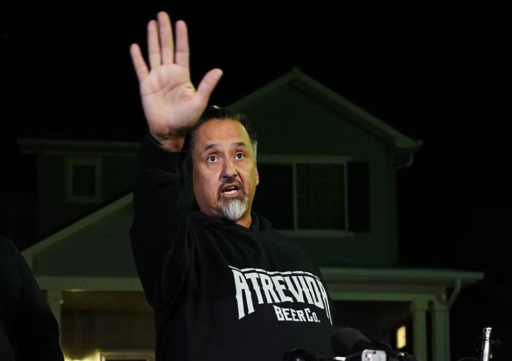 Richard Fierro outside his home in Colorado Springs.  (AP Photo/Jack Dempsey)