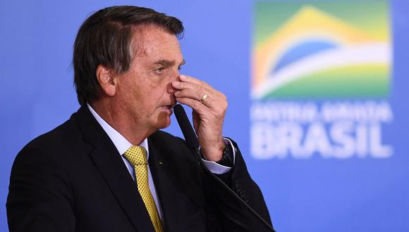 Jair Bolsonaro logró responder al informe de la Comisión del Senado de Brasil. "Es una payasada", sentenció. (Foto: EVARISTO SA / AFP)