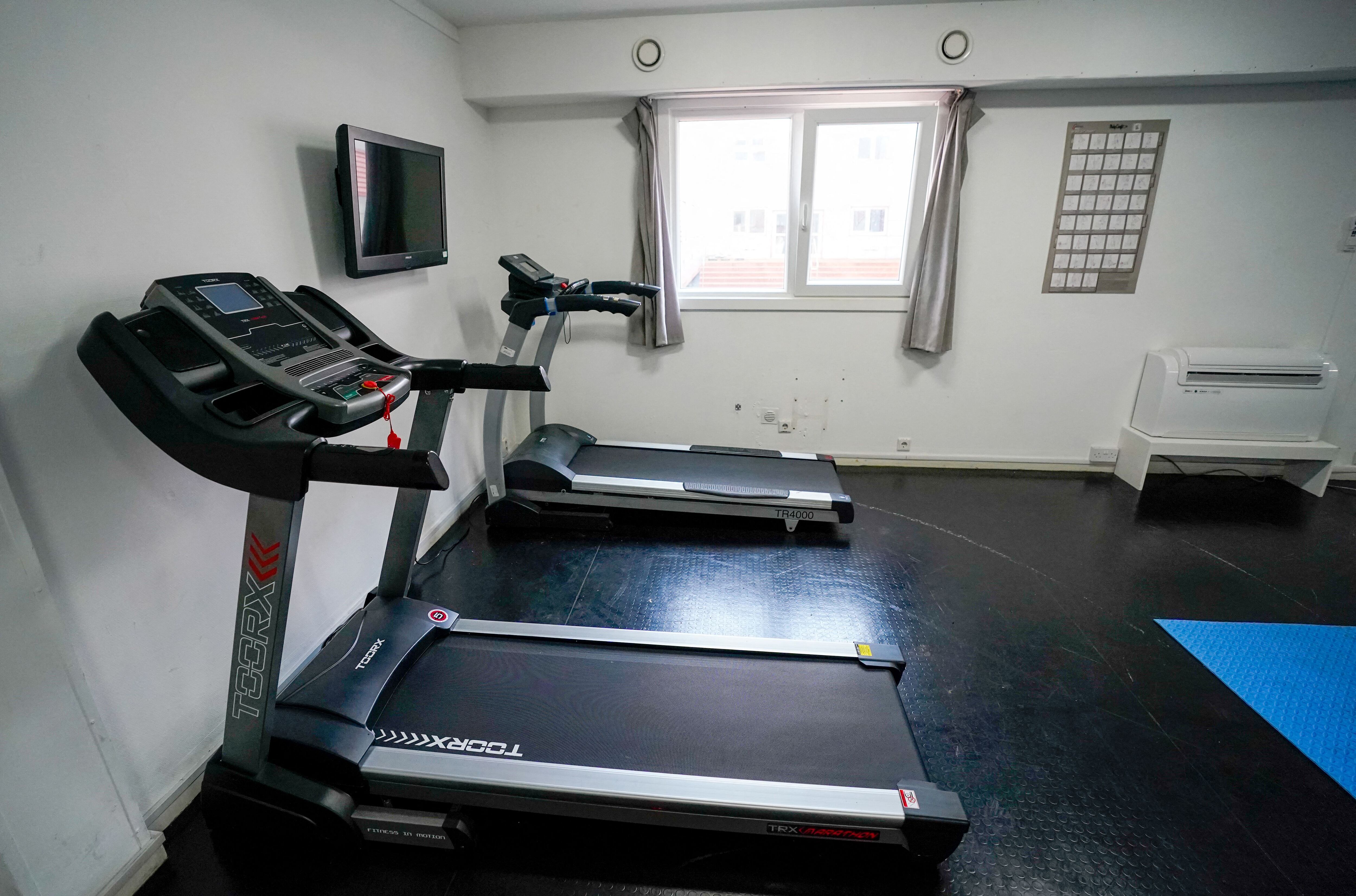 The gym aboard the accommodation barge Bibby Stockholm.  (Photo by Andrew Matthews / AFP).