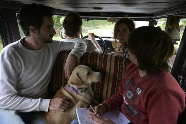 The Argentine Job family and Timon, their dog, were staying in a 1928 Graham-Baiz car on March 10, 2022, near Cavuleguaychow in the province of Entre Rஸ்os, Argentina.  (JUAN MABROMATA / AFP)