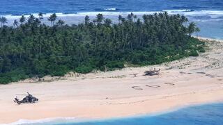 Tres hombres perdidos en isla desierta del Pacífico son rescatados tras escribir SOS | FOTOS