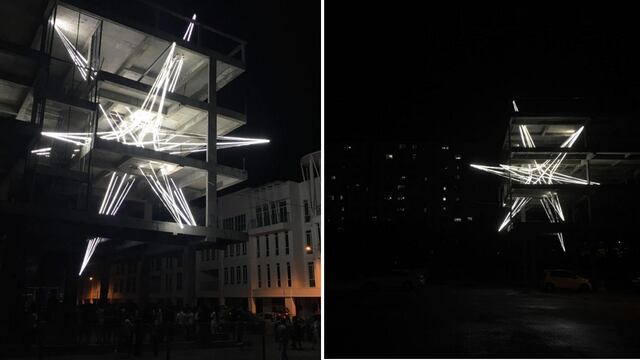 Una estrella LED brilla en este edificio abandonado de Malasia