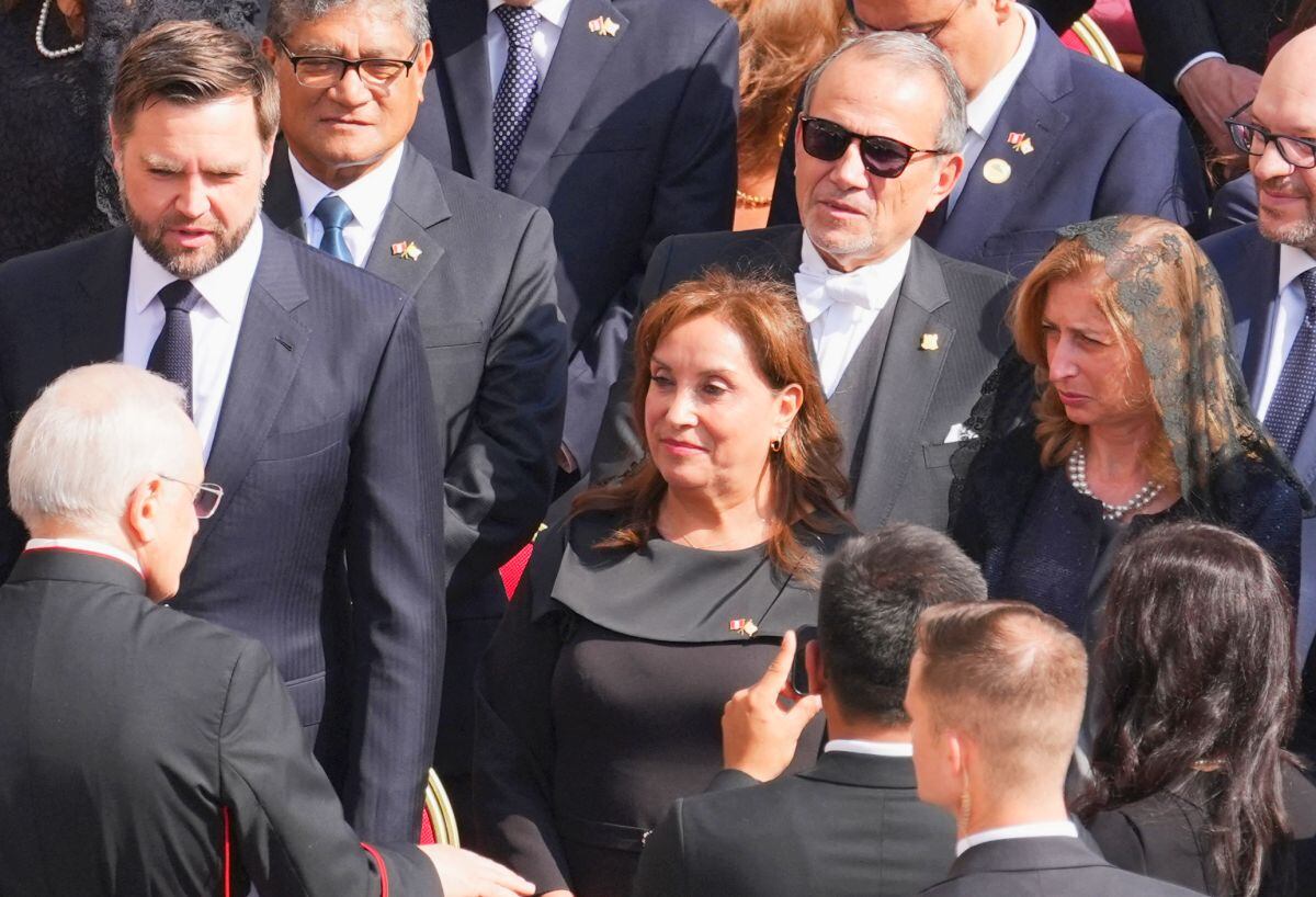 Vice President JD Vance (C), Peru's President Dina Boluarte (C, R) are greeted as they arrive to attend a Holy Mass for the Beginning of the Pontificate of Pope Leo XIV, in St Peter's square in The Vatican on May 18, 2025. (Photo by Jacquelyn Martin / POOL / AFP)