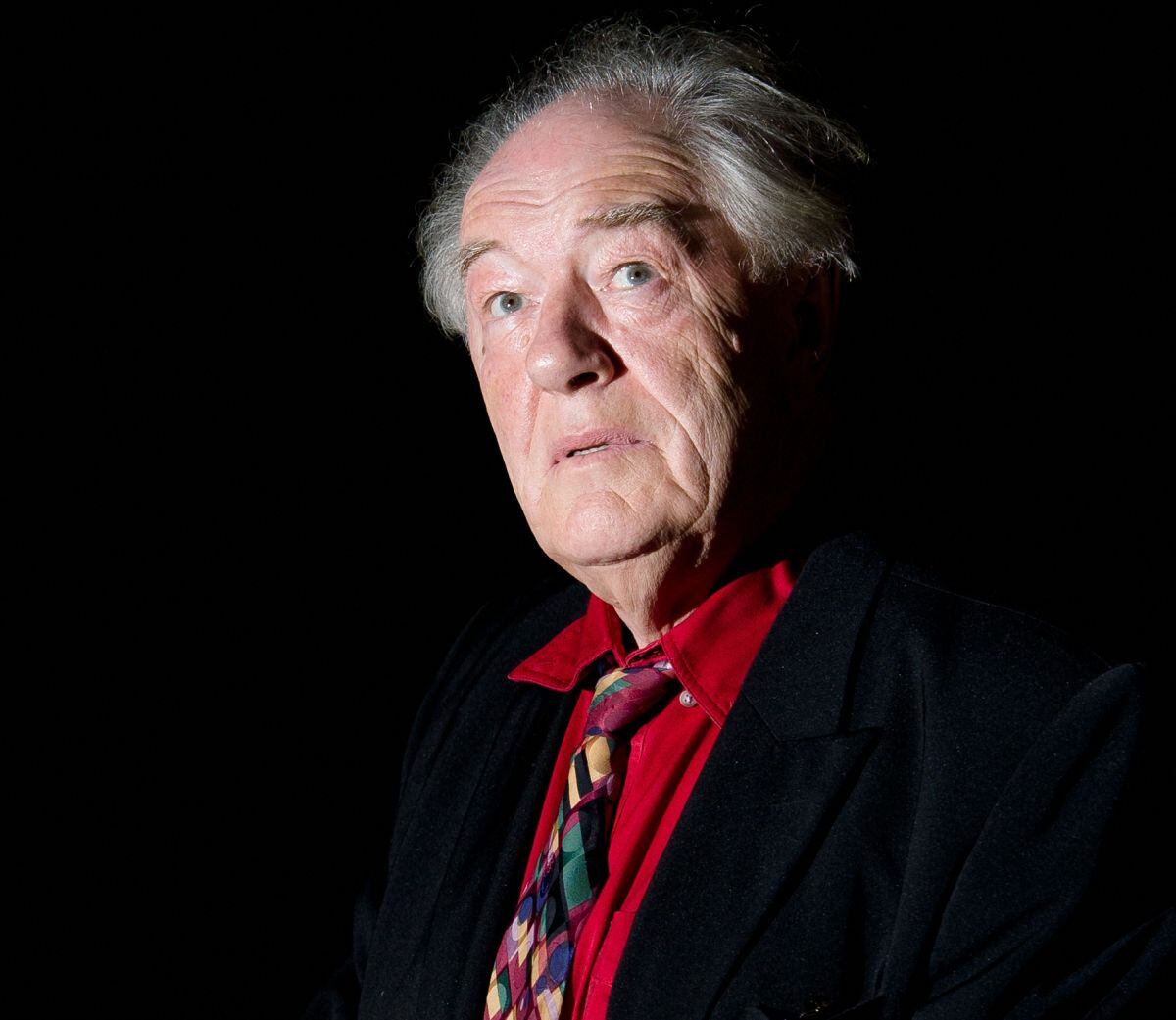 La vez que Michael Gambon posó para los fotógrafos antes de los Evening Standard Film Awards en el centro de Londres el 4 de febrero de 2013 (Foto: Leon Neal / AFP)