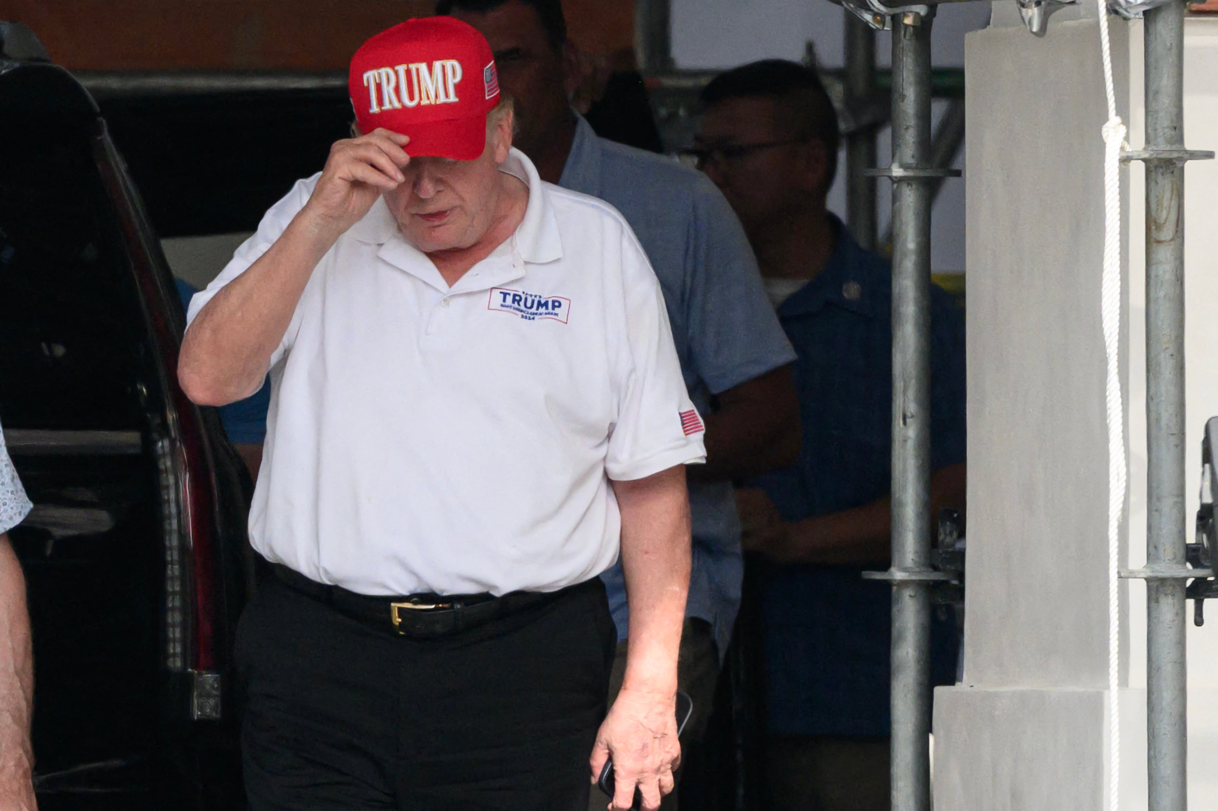 El presidente estadounidense Donald Trump es visto a su regreso a la Casa Blanca en Washington, D.C., el 11 de julio de 2026, tras pasar el día en su club de golf en Virginia. (Foto de Mandel NGAN / AFP).