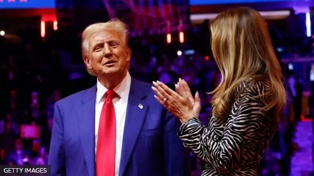 Donald Trump en el mitin de Nueva York junto a su esposa. (Getty Images).