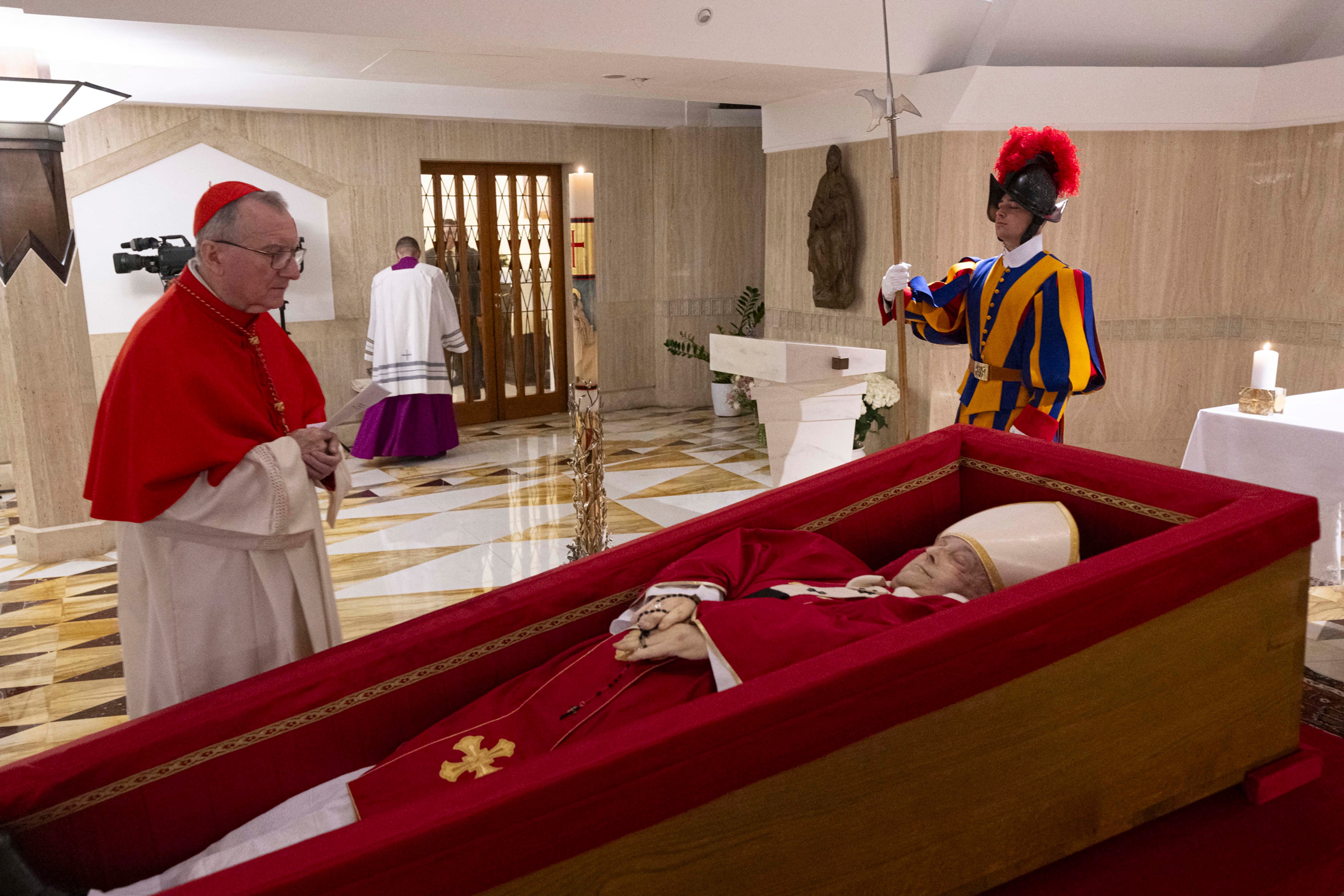 The Vatican Media shows Pope Francis in his open coffin in The Vatican. (Photo by Handout / VATICAN MEDIA / AFP)