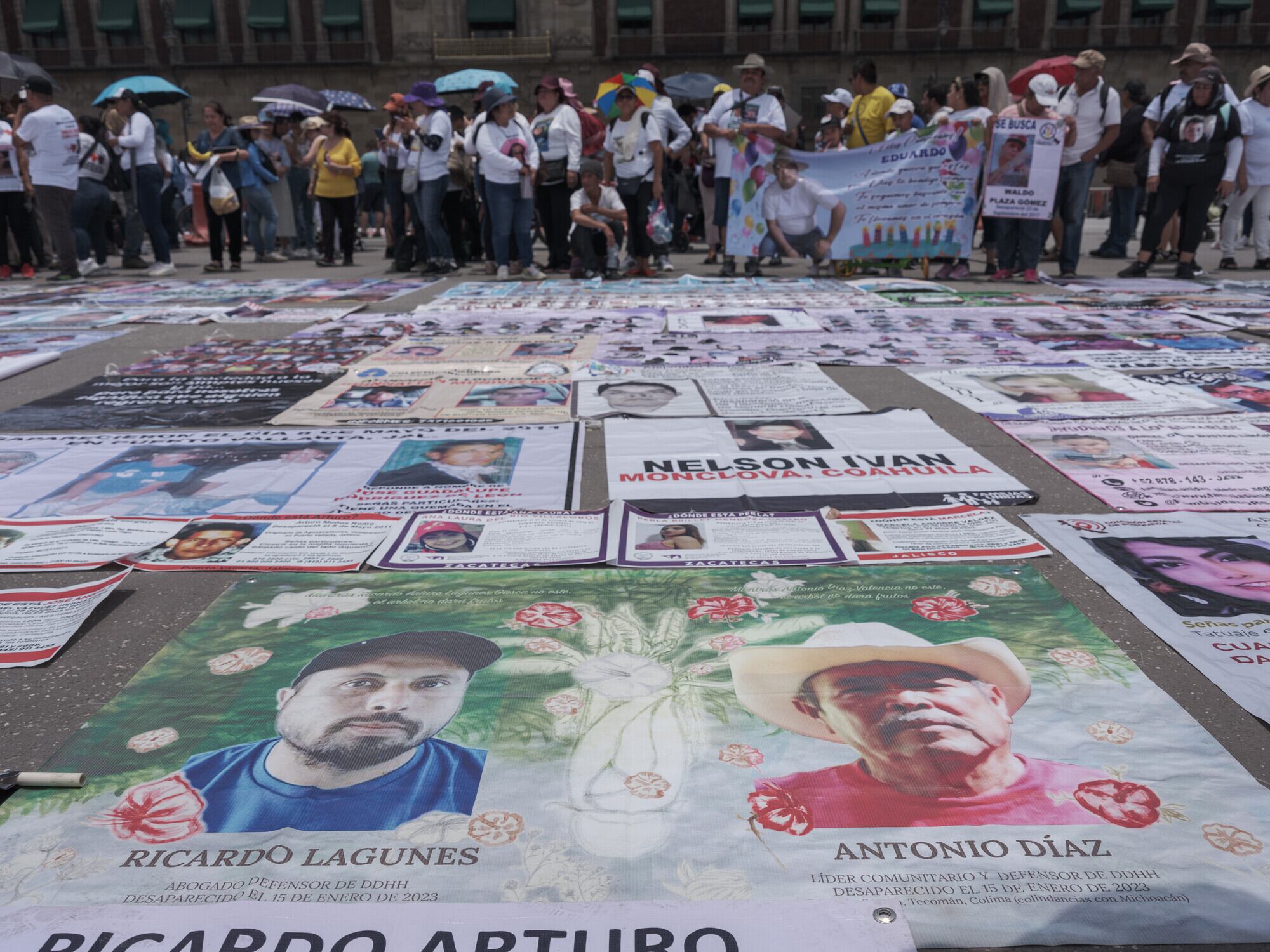 CDMX, MEXICO, May 10, 2024: Search signs of Ricardo Arturo Lagunes Gasca, a renowned human rights lawyer, and Antonio Díaz Valencia, leader of the Aquila Indigenous community in the state of Michoacán, during a protest for disappeared people on Mother's Day in the center of Mexico City. Relatives of two missing Mexican environmentalists suspect Ternium, an influential transnational mining company, of involvement in their disappearance, highlighting the dangers faced by environmental defenders in Mexico, where criminal groups often operate with impunity. CREDIT: Luis Antonio Rojas for Global Witness.