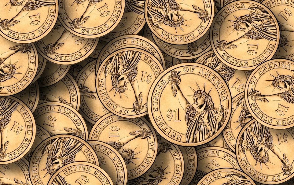 Un montón de monedas simbólicas de un dólar con la cara de la Estatua de la Libertad. (Foto: Pixabay)