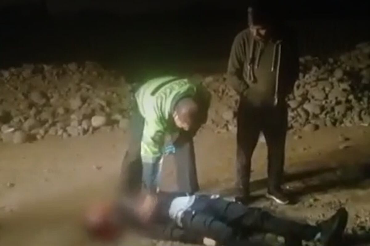 Hombre no identificado fue asesinado a balazos cerca a los rieles del tren. (Foto: Captura / América Noticias)