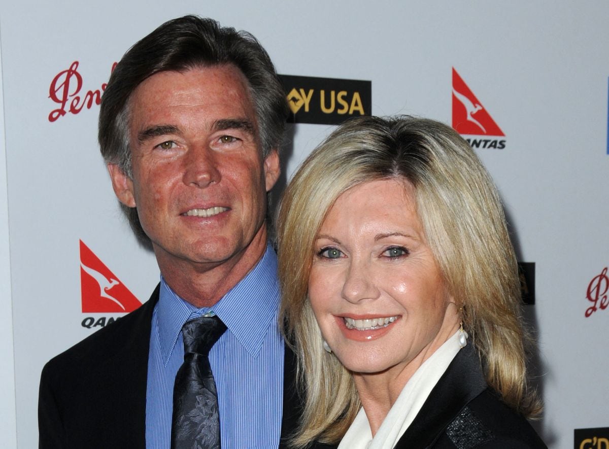 La actriz Olivia Newton-John y su esposo John Easterling asisten a la Gala G'Day USA Australia Week 2009 celebrada en el teatro Kodak de Los Ángeles, el 18 de enero de 2009 (Foto: Chris Delmas / AFP)