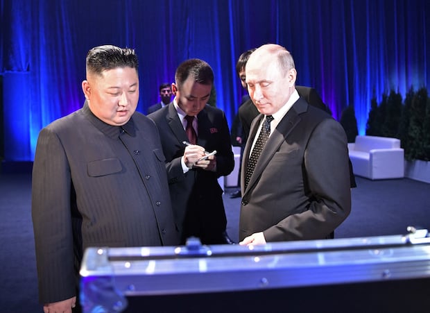 Putin and Kim exchanged gifts on April 25, 2019, after talks at the Far Eastern Federal University campus in Vladivostok.  (Photo by Alexey Nikolsky/Sputnik/AFP).