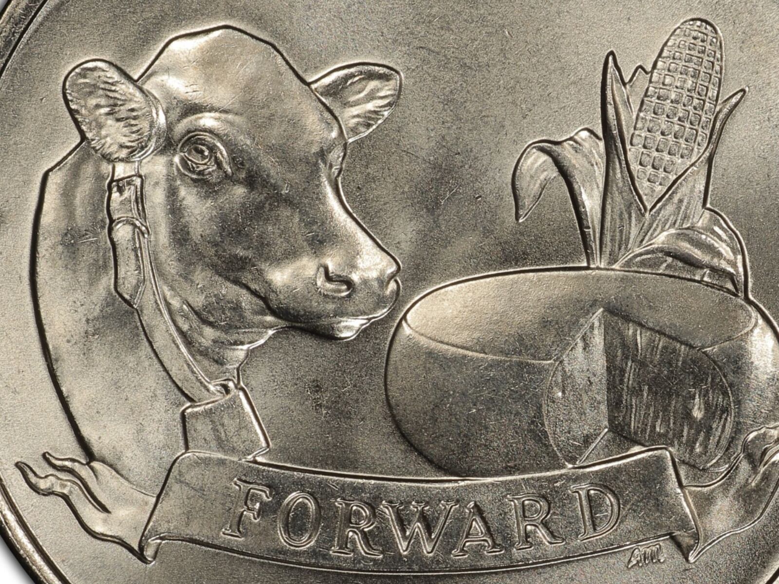 La moneda de 25 centavos de Wisconsin se lanzó en 2004, como un homenaje al estado que ha destacado por la producción y comercio de leche en Estados Unidos (Foto: PCGS)