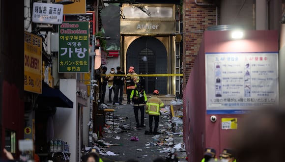 Una estampida de Halloween en octubre del 2022 en el vecindario de Itaewon dejó como saldo más de 150 muertos en Corea del Sur. (Foto de ANTHONY WALLACE / AFP)