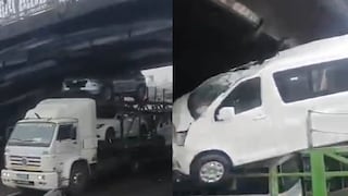 Cercado de Lima: camión grúa que transportaba vehículos nuevos queda atascado en puente Balta | VIDEO