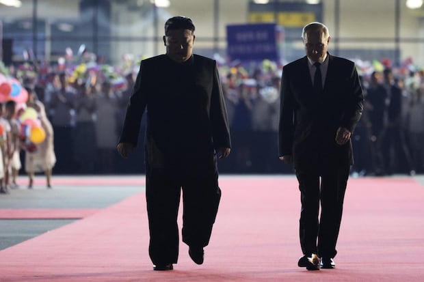 Putin and Kim walk during a farewell ceremony at Sunan International Airport on June 19, 2024 in Pyongyang, North Korea.  (EFE/EPA/GAVRIIL GRIGOROV / SPUTNIK / KREMLIN).