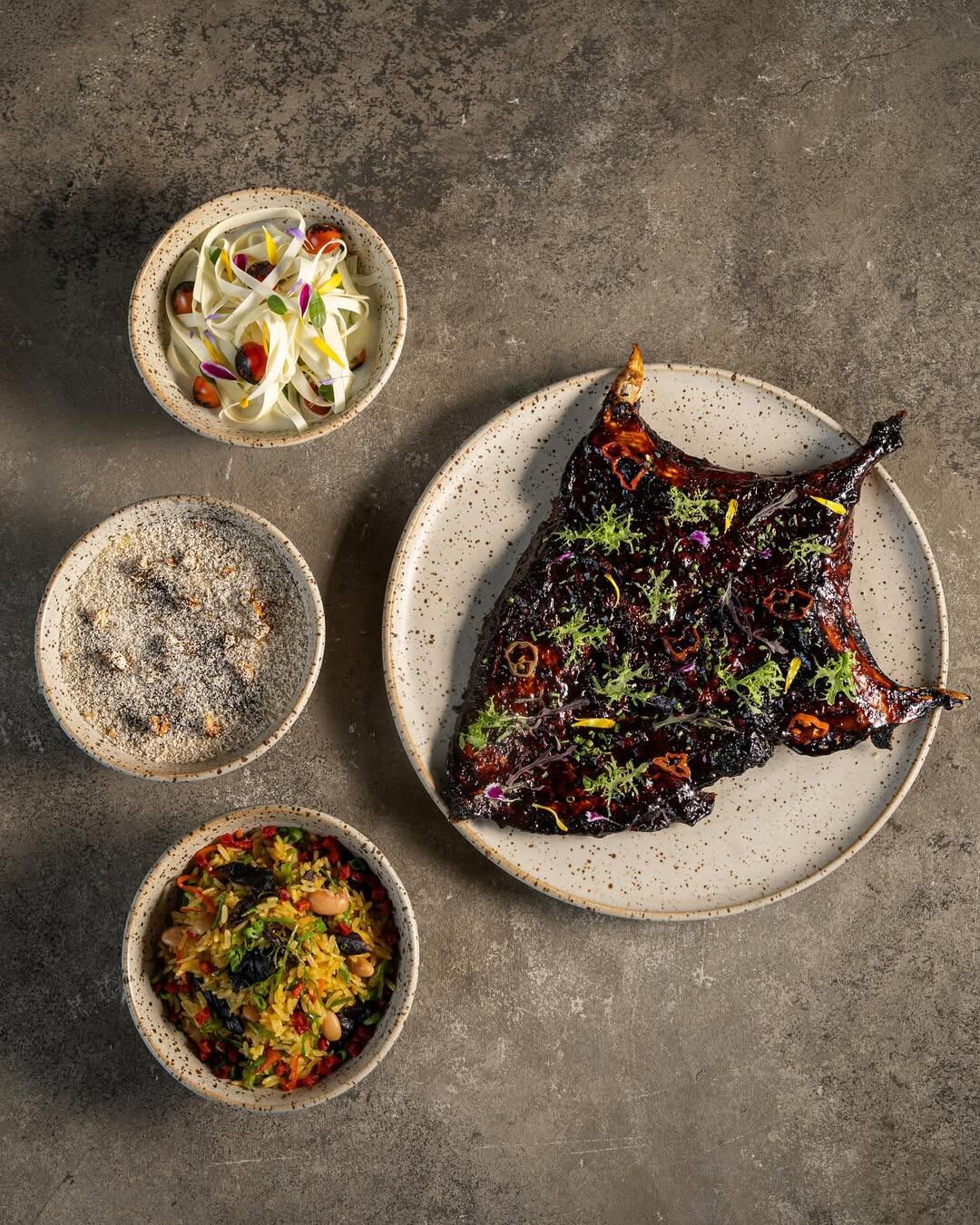 Collar de corvina, panca, chonta, castañas y lacado nikkei.