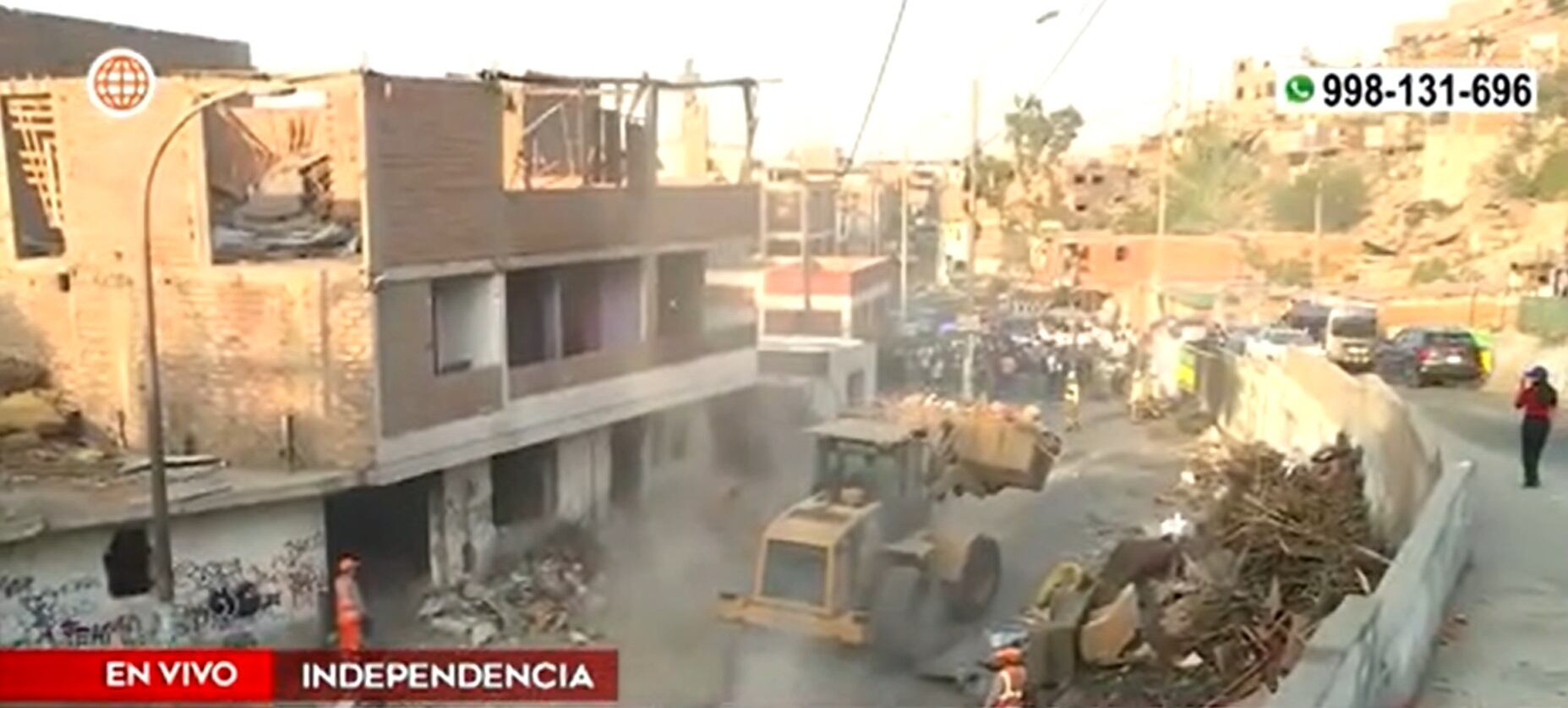 Las casas expropiadas en Independencia para la construcción de un anillo vial lucen abandonadas y se han convertido en guaridas de delincuentes, según denunciaron vecinos aledaños. (Foto: Captura América Noticias)