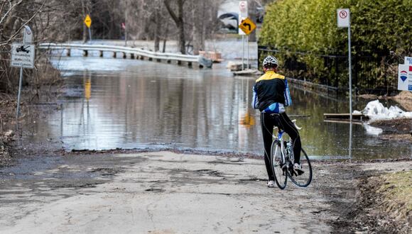 Las lluvias recientes y el deshielo han causado el desborde de varios ríos. (Foto: AFP/referencial)