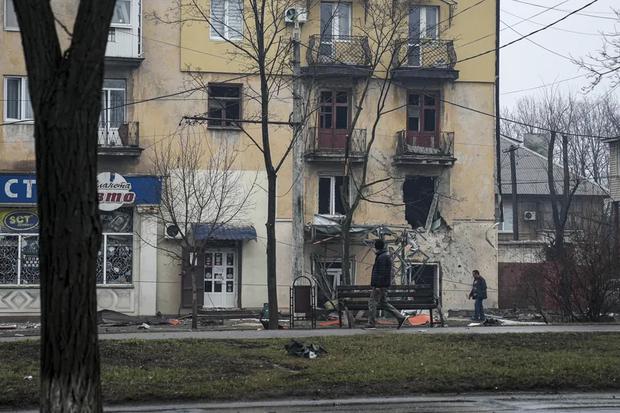 A building hit by Russian bombardment in Mariupol.  (Evgeny Maloletka - AP).