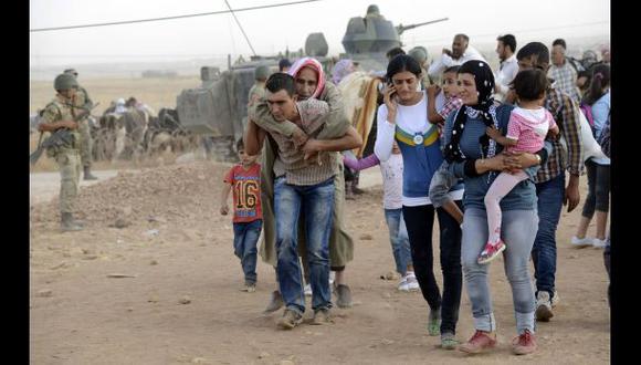 Unos 100.000 kurdos sirios huyeron a Turquía de los islamistas