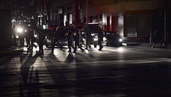 En esta nota te contamos los horarios y fechas de cortes de luz que habrá esta semana, por parte de Enel. (Foto: AFP)