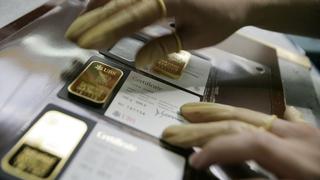 Precios del oro cotizan estables antes de minutas de la Fed y datos clave