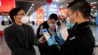 Termómetros, mascarillas y nuevas tecnologías: la vida diaria en la China del coronavirus | FOTOS