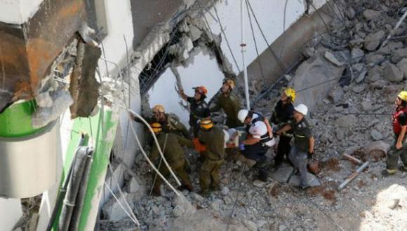 Dos muertos y 23 heridos deja derrumbe de edificio en Tel Aviv