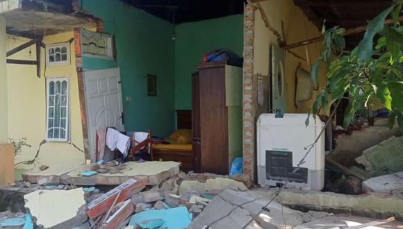 Una casa dañada después de un terremoto de magnitud 6,2 en el pueblo de Kajai, West Pasaman, Indonesia, el 25 de febrero de 2022. (IDENVI SUSANTO / AFP).