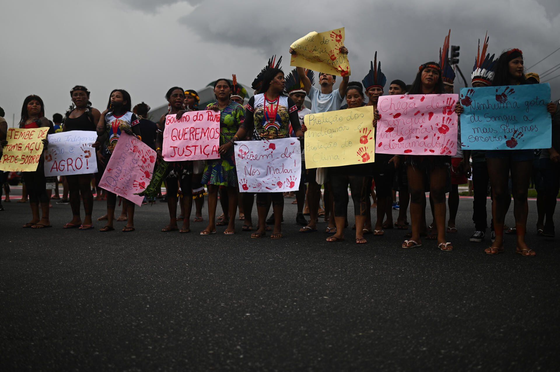 Indigenous people of different ethnic groups participate in a march for land demarcation, and against violence on indigenous lands and agribusiness, today, one day before the summit of the Amazon countries, in Belém, Pará (Brazil).  EFE/André Borges