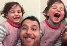 La historia del padre sirio que le hace creer a su hija que los bombardeos son un juego | VIDEO