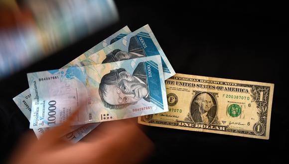 En Venezuela, el país de la revolución bolivariana, todo se puede comprar si se tienen dólares, pero a condición de ser discretos en todo momento. (AFP).