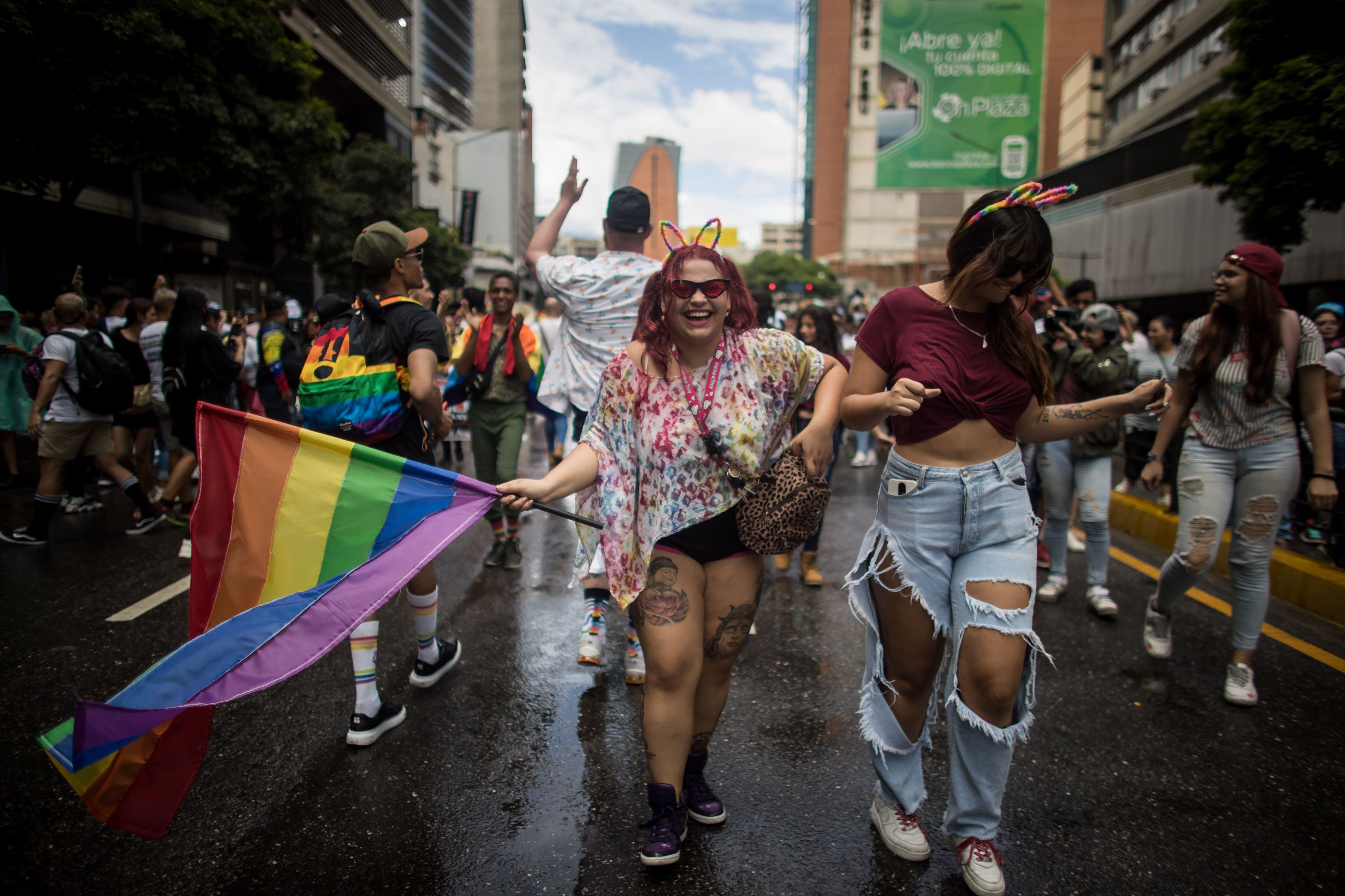 Hundreds of people participate in the LGBTIQ+ Pride Day march in Caracas (Venezuela).