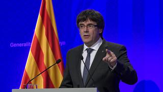 Cataluña: Puigdemont pide retiro de fuerzas policiales