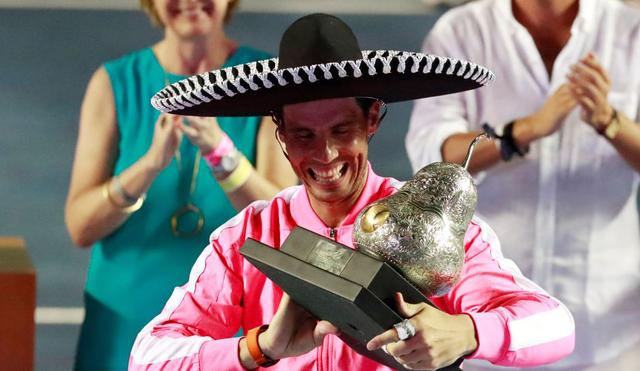 Tennis - ATP 500 - Mexican Open - Princess Acapulco Stadium, Acapulco, Mexico - February 29, 2020    Spain's Rafael Nadal celebrates with the trophy after winning his final match against Taylor Fritz of the U.S.   REUTERS/Henry Romero