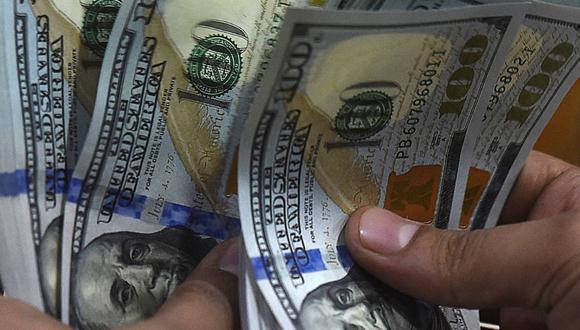 Sepa aquí a cuánto se cotiza el dólar en Colombia este 9 de marzo de 2022. (Foto: AFP)