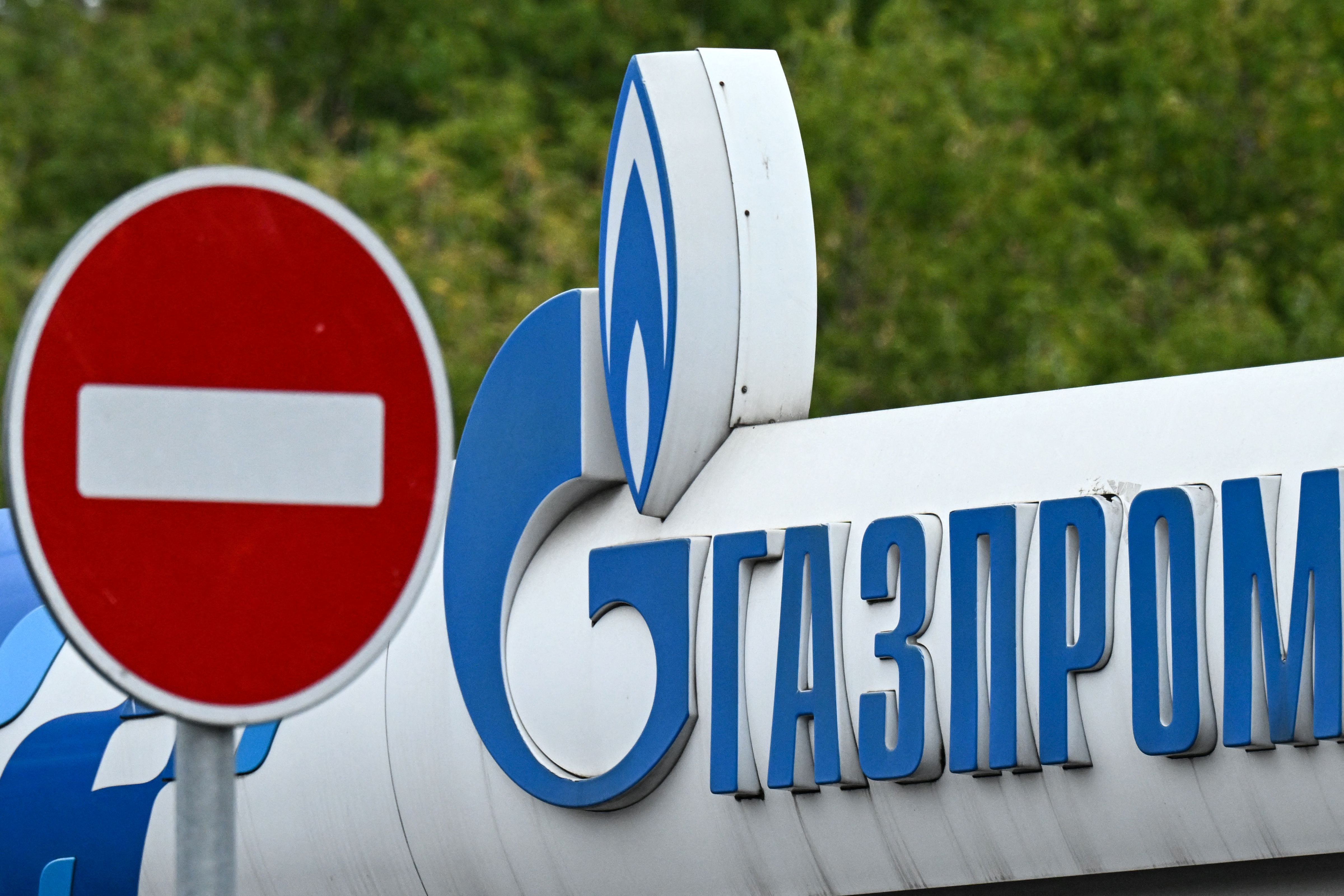 The logo of the Russian energy giant Gazprom on a gas station in Moscow.  (Photo by Kirill KUDRYAVTSEV / AFP)