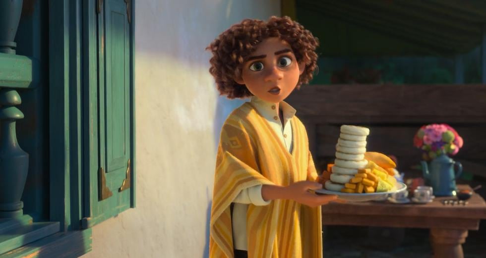 In this scene from "Encanto", Camilo changes his shape so he can eat one more serving of the delicious arepas.  (Photo: Screenshot)
