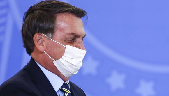 Jair Bolsonaro insiste en que reacción a la pandemia de coronavirus fue exagerada. (Foto: Sergio LIMA / AFP).