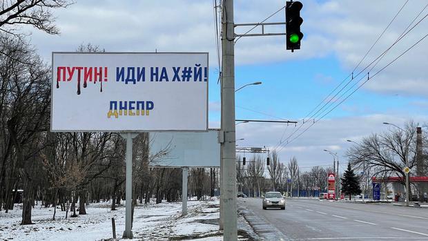An advertisement in Dnipro with a direct and crude insult to Vladimir Putin.