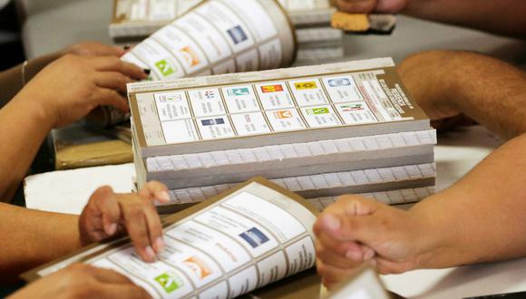 La compra de votos es considerada un delito electoral. | Foto: Reuters