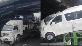 Cercado de Lima: camión grúa que transportaba vehículos nuevos queda atascado en puente Balta | VIDEO