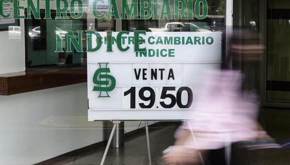 El tipo de cambio abría a la baja por tercera sesión consecutiva en el mercado de México. (Pedro PARDO / AFP)
