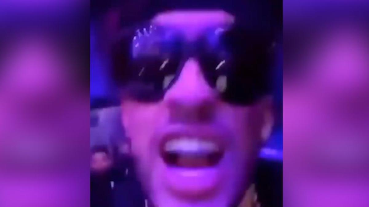 Rapper Bad Bunny Recreates Triple H's Iconic Water Spit At NBA Game