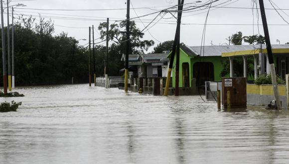 Se ve una calle inundada después del paso del huracán Fiona en Salinas, Puerto Rico, el 19 de septiembre de 2022. (Foto de José Rodríguez / AFP)
