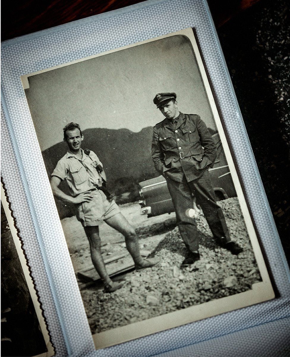 An image in a Godelieve Soete photo album shows her father, Gerard, on the right with her brother, Michel, who also participated in the destruction of the bodies.  (JELLE VERMEERSCH).