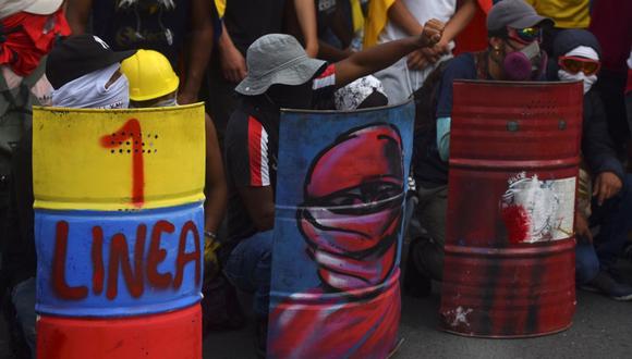 Jóvenes de la Primera Línea participan de una manifestación el 18 de mayo de 2021 en Yumbo, Valle del Cauca, Colombia.  (EFE/ Ernesto Guzmán Jr).