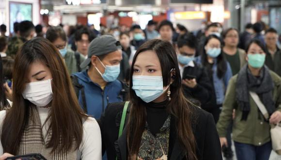 El virus está presente ya en al menos 13 provincias chinas, además de las regiones administrativas especiales de Hong Kong y Macao, que confirmaron este miércoles sus primeros casos, y en el extranjero por el momento se han detectado al menos 4 afectados en Tailandia, y uno en Japón, Corea del Sur, Taiwán y Estados Unidos. (Foto: AFP).