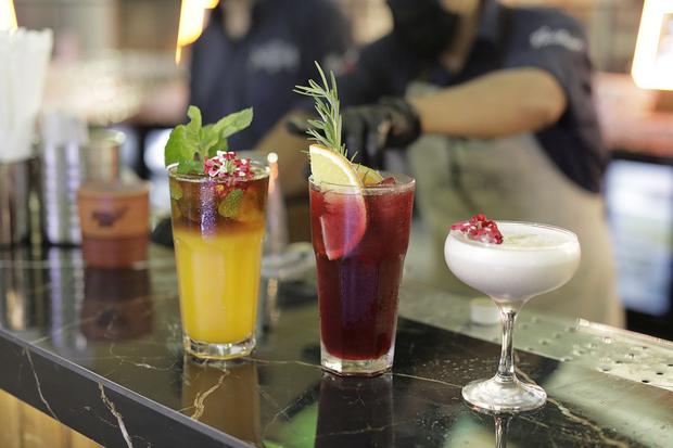 Three of the most striking cocktails from the original 1800 Tequila menu at Mercado San Ramón.  (Photo: Anthony Niño de Guzmán / GEC)